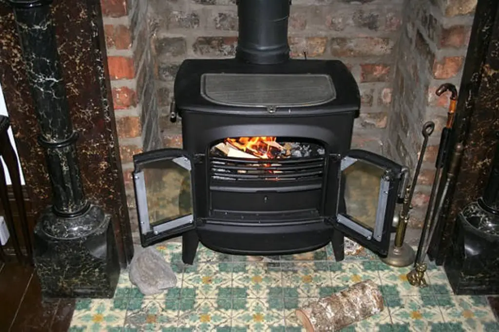 Wood stove with fire box larger than 2 cubic feet